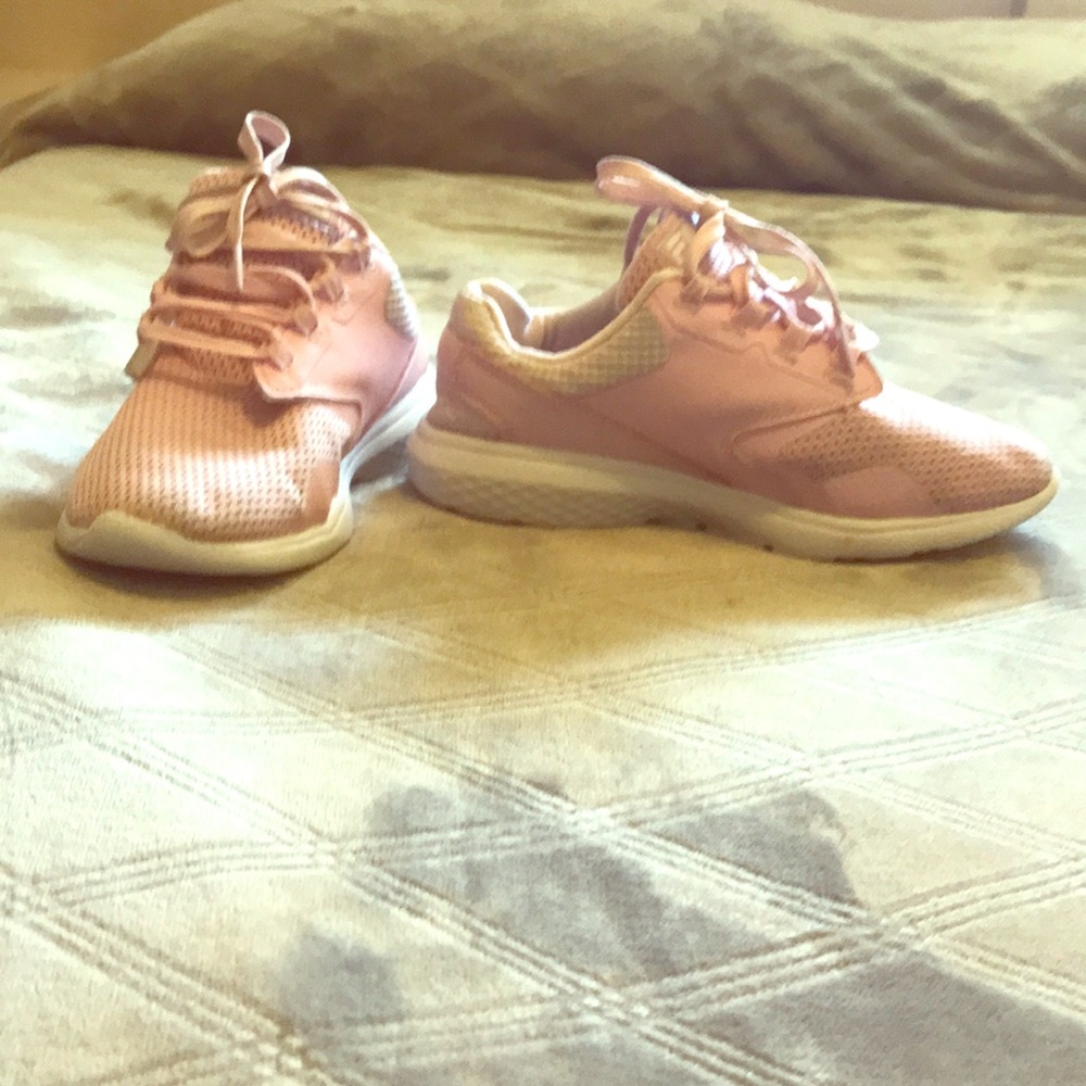 Pink sneakers.